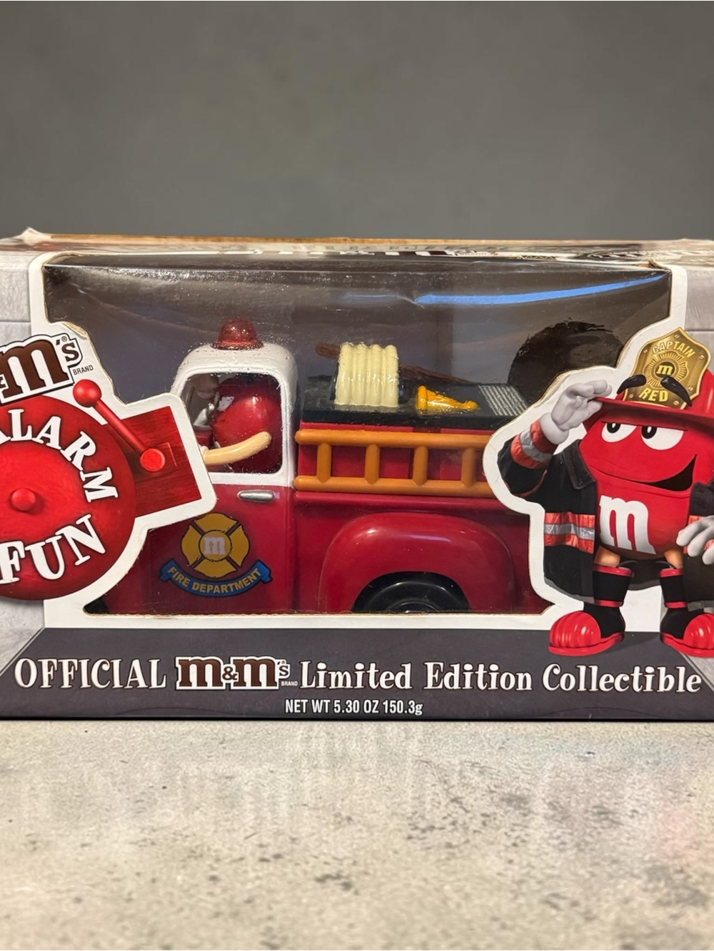 M&M'S Red Fire Truck Toy with Yellow Ladder Accents